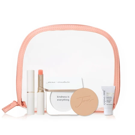 Jane Iredale Forever You Kit with selected PurePressed Base shade, white compact, Forever You lip stain, Smooth Affair mini primer and a pink-trim cosmetic bag.