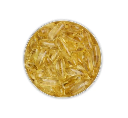 Open Skin Omegas+ tin filled with brown transparent supplement capsules.