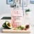 Rejuvenated Female Hormone Support pink pack on a kitchen counter with avocado, celery and garlic.