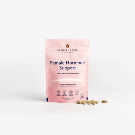 Rejuvenated Female Hormone Support pink pack with beige capsules on a white background.