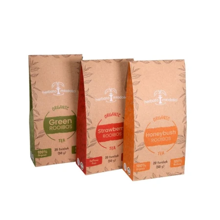 Three SAROOBOS tea flavours arranged one behind another: Green Rooibos, Strawberry and Honeybush.