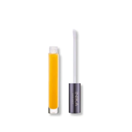 INIKA Organic Lip Serum bottle with yellow serum and sponge applicator