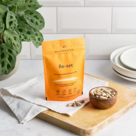Rejuvenated Re-Set orange supplement pack on a clean background.