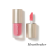 Jane Iredale ColorLuxe Liquid Blush tube in a light pink shade with the applicator removed.