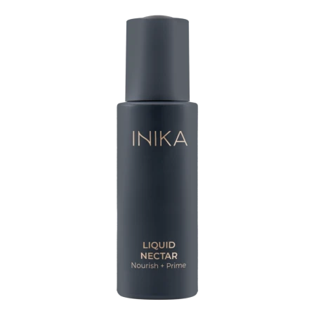 Closed INIKA Organic Liquid Nectar Nourish + Prime bottle in dark matte glass