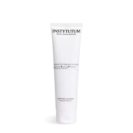 Minimalist product shot of INSTYTUTUM Adaptogel Cleanser in a slim white tube