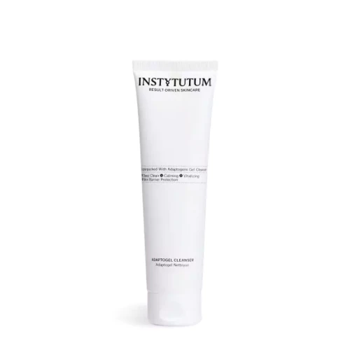 Minimalist product shot of INSTYTUTUM Adaptogel Cleanser in a slim white tube