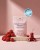 Rejuvenated Female Hormone Support pink pack with strawberries, cherries and award badge.