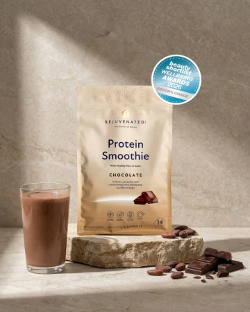 Rejuvenated Protein Smoothie Chocolate pack with chocolate drink, chocolate pieces and award badge.