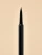 Close-up of the fine pointed applicator of INIKA Organic Liquid Eyeliner Black