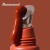 Cooling metal applicator with INIKA Organic Tinted Lip Serum in the Rosewood shade.