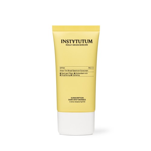 Yellow tube of INSTYTUTUM Sunscription Dark Spot Defence SPF50 on a minimalist background