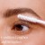Jane Iredale PureLash Conditioner being applied to lashes with a spiral brush