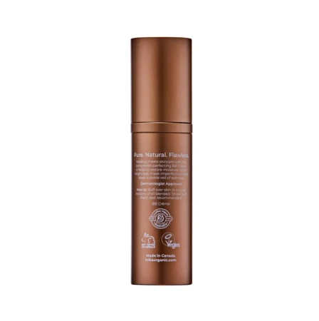 Back view of INIKA Organic BB Cream in an elegant bottle with a copper pump.