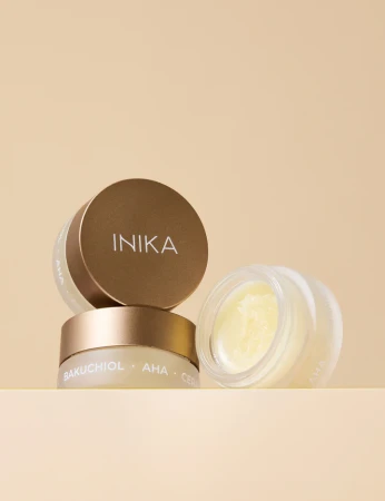 Open jars of INIKA Organic Lip Mask Bakuchiol + AHA with nourishing formula