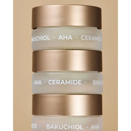 Three stacked INIKA Organic Lip Mask jars highlighting bakuchiol, AHA and ceramides