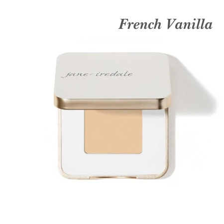 Jane Iredale eyeshadow in French Vanilla, shown in an elegant white compact with subtle gold trim. The shade is a light warm beige.